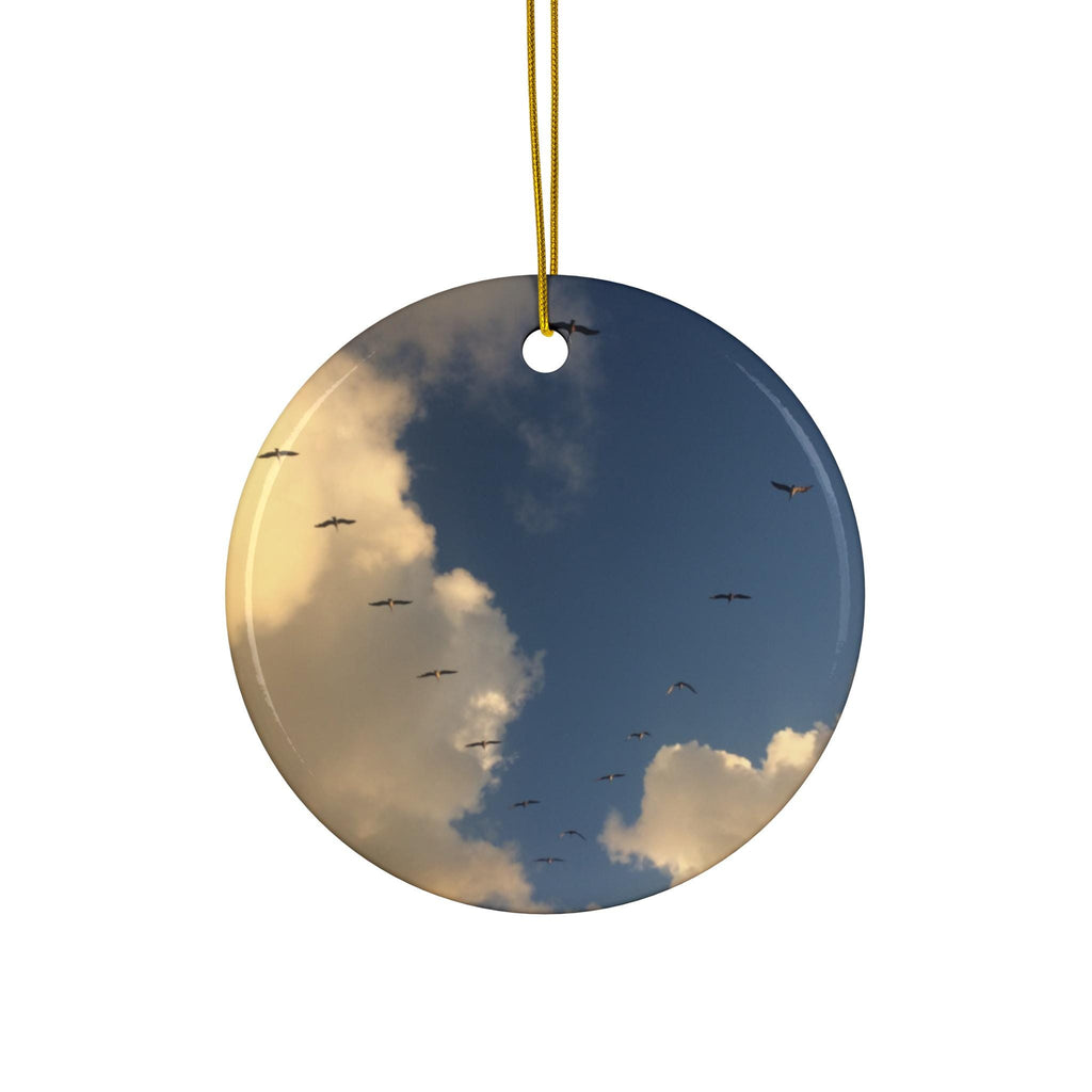 Christmas Ornament With blue skies and a migrating flock of sandhill cranes