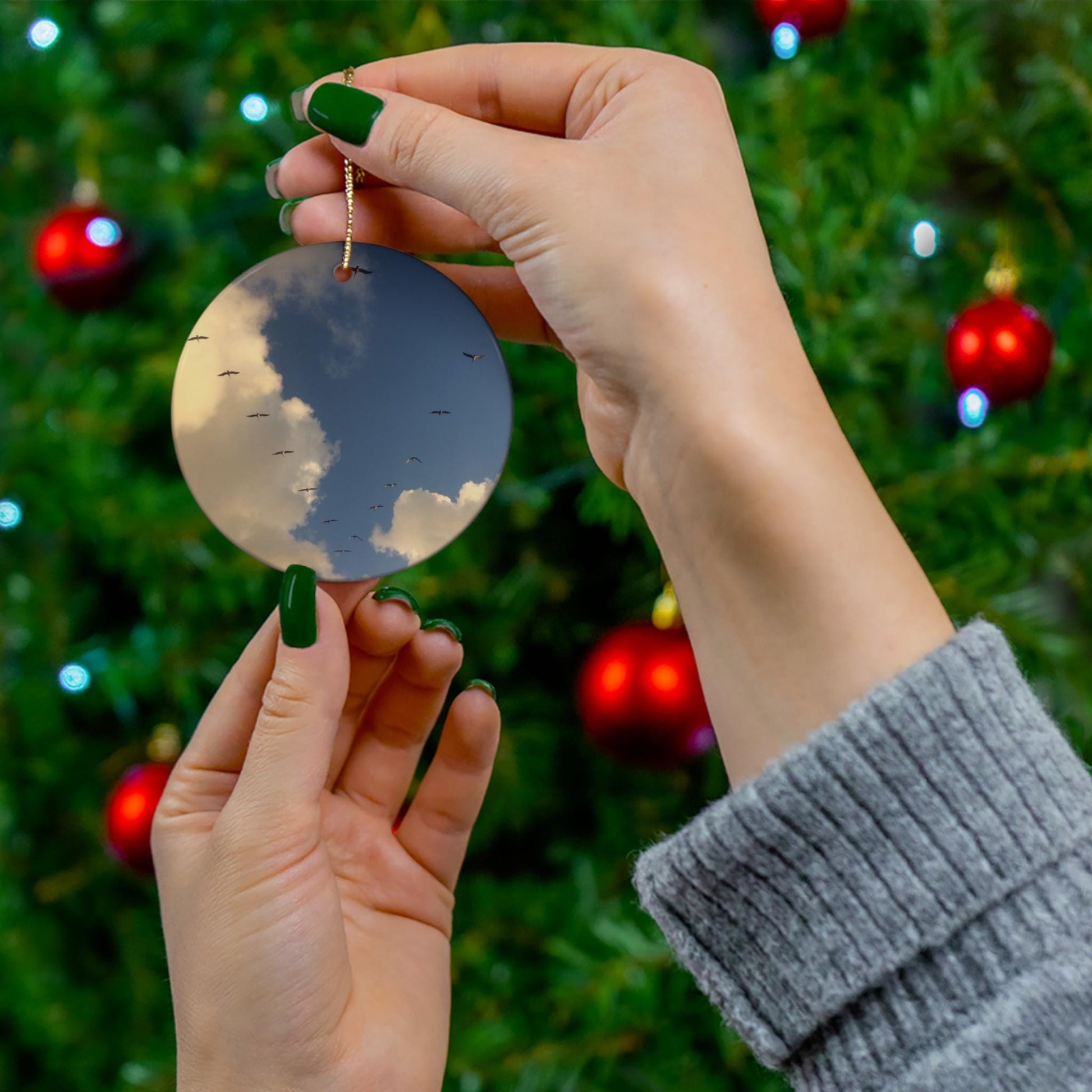 Christmas Ornament With blue skies and a migrating flock of sandhill cranes